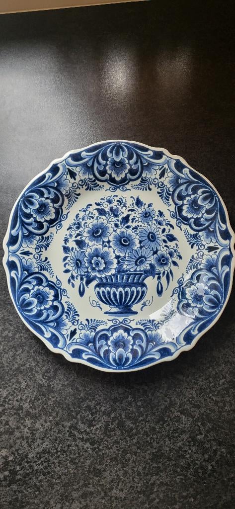 Delfts Blauw bord, Ophalen