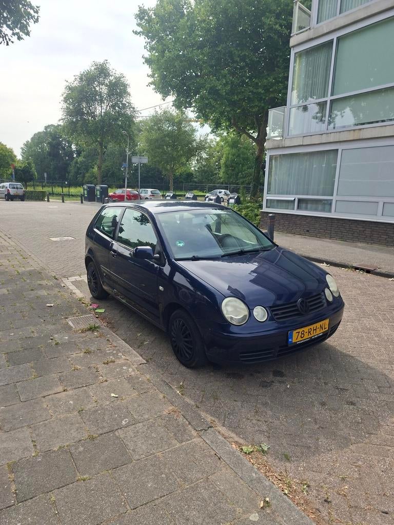 Volkswagen Polo 1.4 55KW 2005 Blauw, Auto's, Voorwielaandrijving, 4 cilinders, Blauw, Origineel Nederlands