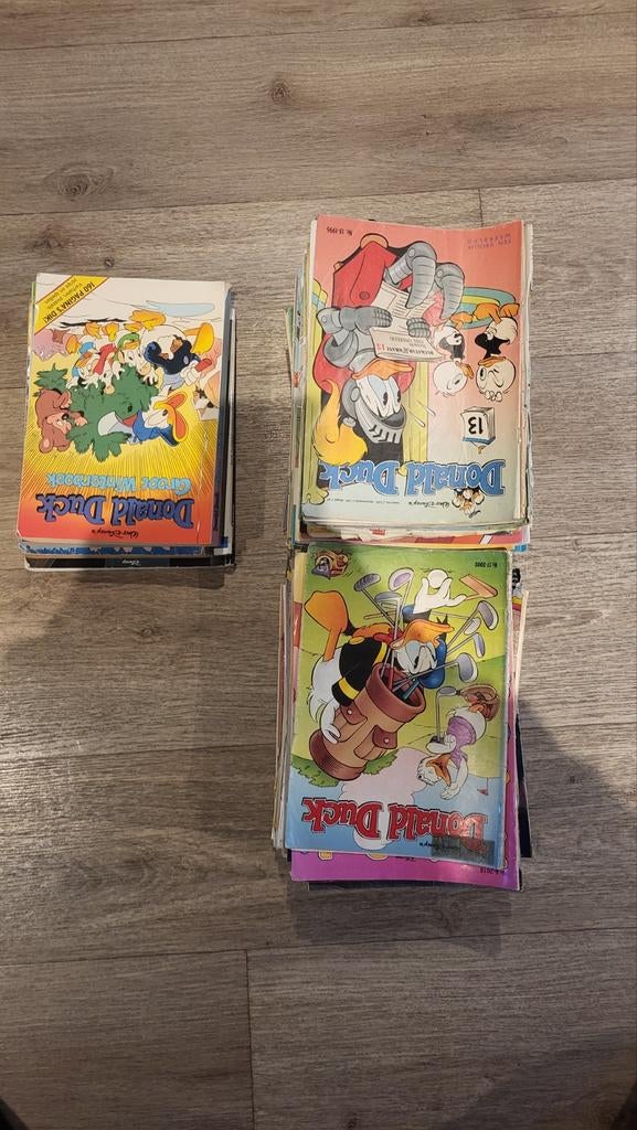Donald Duck weekbladen en een jaarboek, Boeken, Ophalen of Verzenden