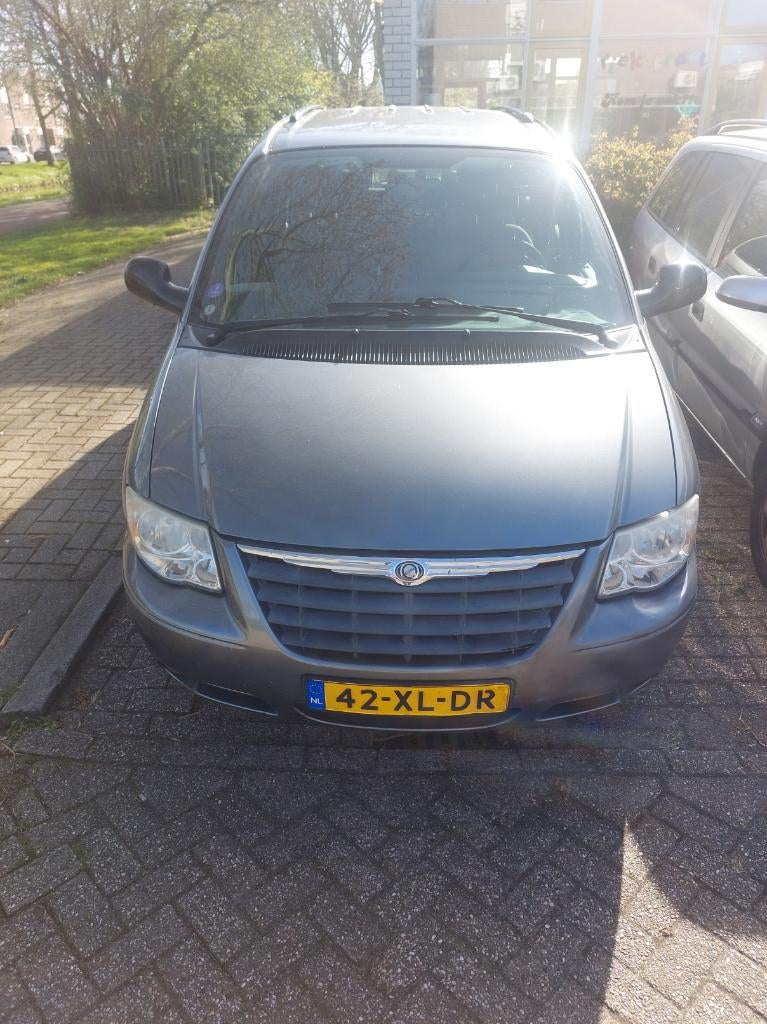 Chrysler Voyager 3.3 I AUT 2007 Grijs, Auto's, 3301 cc, 7 stoelen, Origineel Nederlands, Particulier