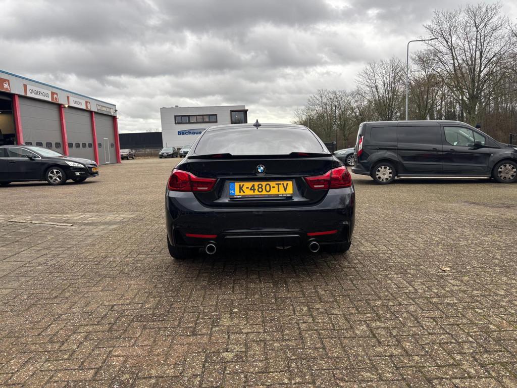 BMW 4-serie Gran Coupé 440i xDrive Centennial High Executiv, Auto's, 327 pk, Alcantara, Zwart, 14 km/l