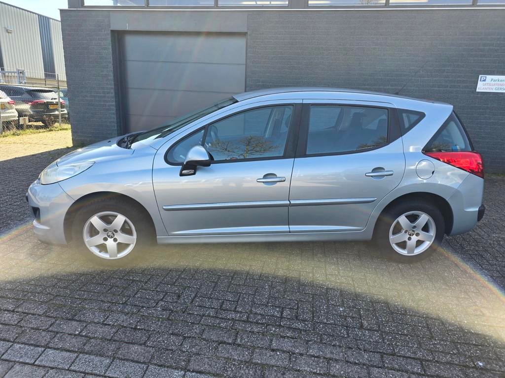 Peugeot 207 1.4 VTI 16V SW 2012 Blauw Trekhaak Nette Auto, Auto's, Voorwielaandrijving, Euro 5, Stof, Zwart