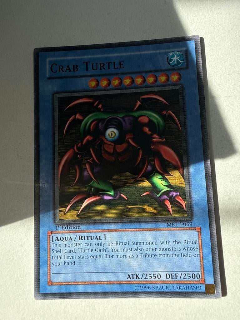 Yu-Gi-Oh! Crab Turtle 1st Edition MRL-E069, Ophalen of Verzenden, Gebruikt, Losse kaart