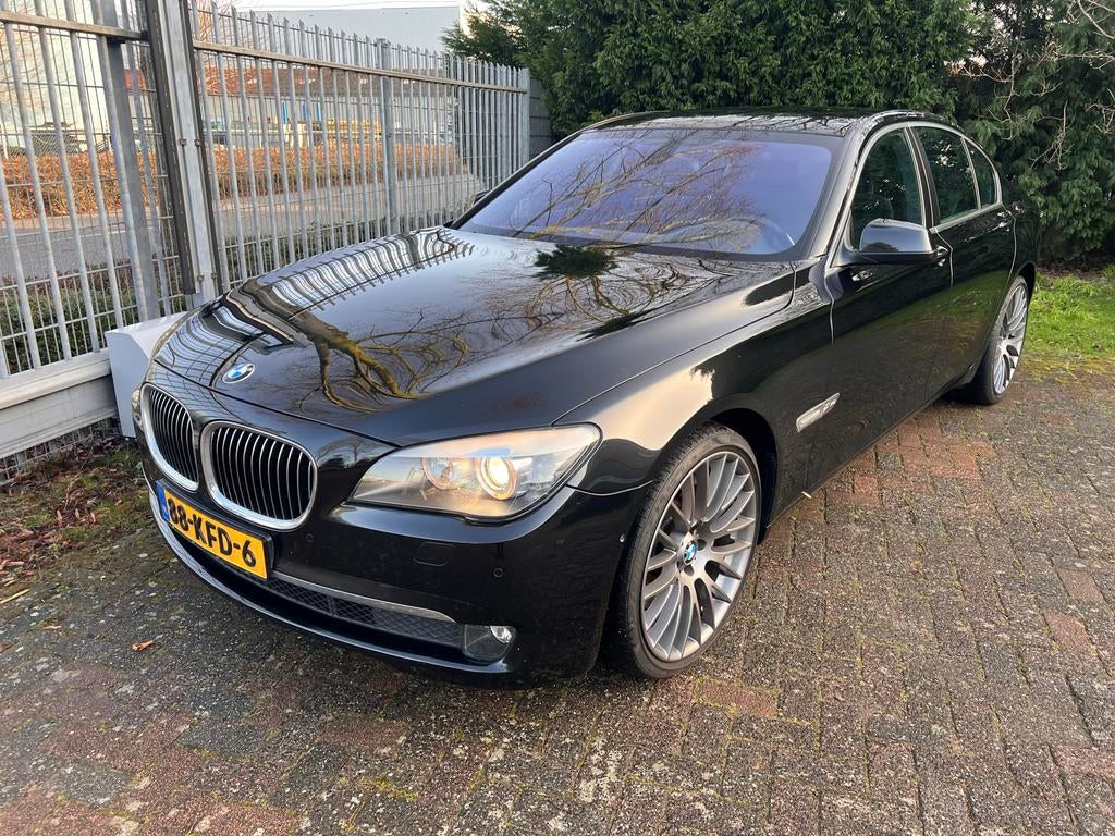 BMW 7-Serie 4.4 750I AUT 2009 Zwart, Auto's, BMW, Automaat, 2005 kg, 4395 cc, Zwart