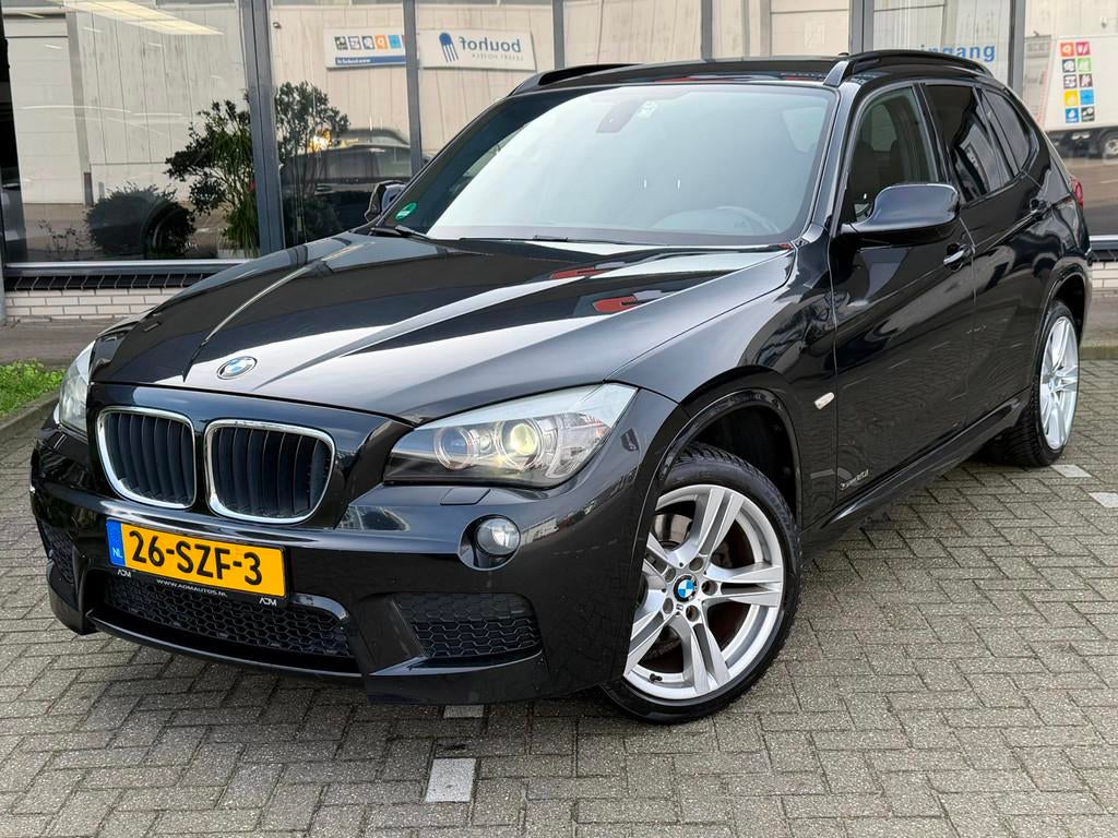 BMW X1 2.0i SDrive Business, Auto's, Euro 5, Achterwielaandrijving, Zwart, 4 cilinders