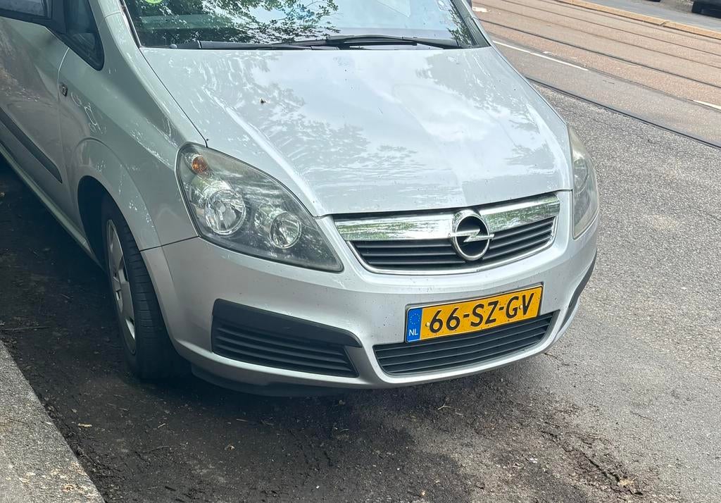 Opel Zafira 1.8 2006 Grijs, Auto's, Opel, 4 cilinders, Origineel Nederlands, Particulier, 1403 kg