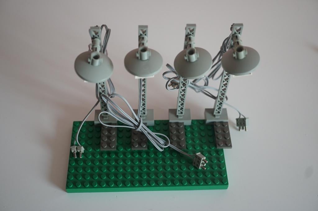 Set van 4 vintage 12 volt Lichtmasten met boekje, Ophalen of Verzenden, Gebruikt, Complete set, Lego