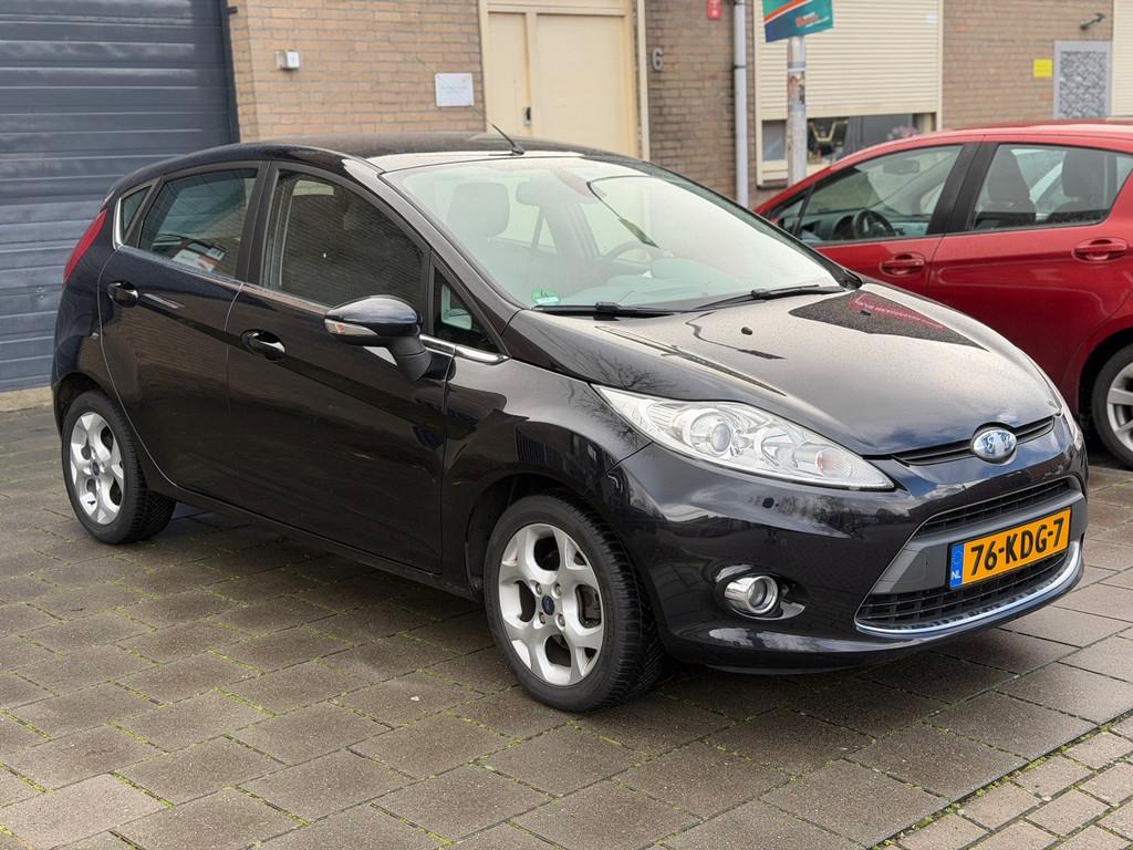 Ford Fiesta 1.4 Titanium Apk cruise Control Clima elektrisch, Voorwielaandrijving, Euro 5, Stof, Parkeersensor
