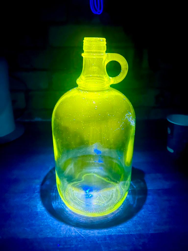 Vintage fles uv reactief, Ophalen