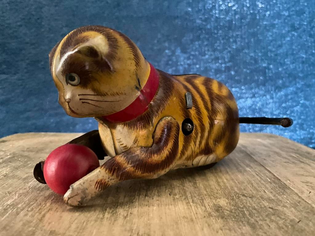 Antieke blikken opwindkat houten balletje cat catching ball, Ophalen of Verzenden