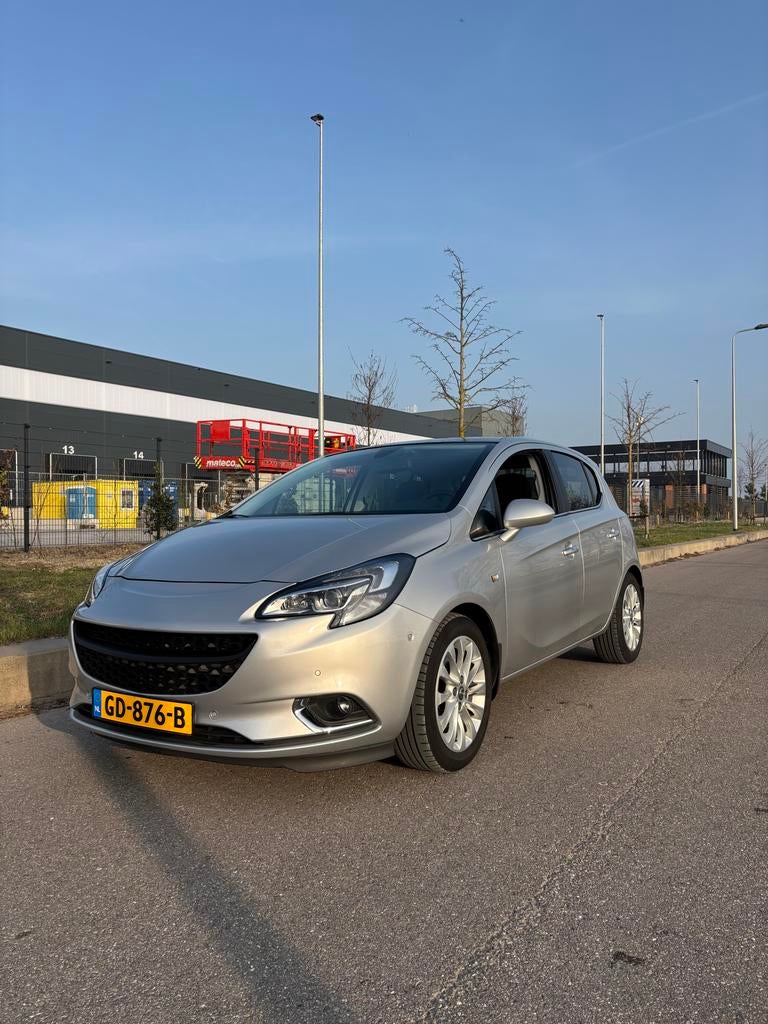 Opel Corsa e 1.0 Turbo full Option dealer onderhouden, Voorwielaandrijving, Origineel Nederlands, Handgeschakeld, 3 cilinders