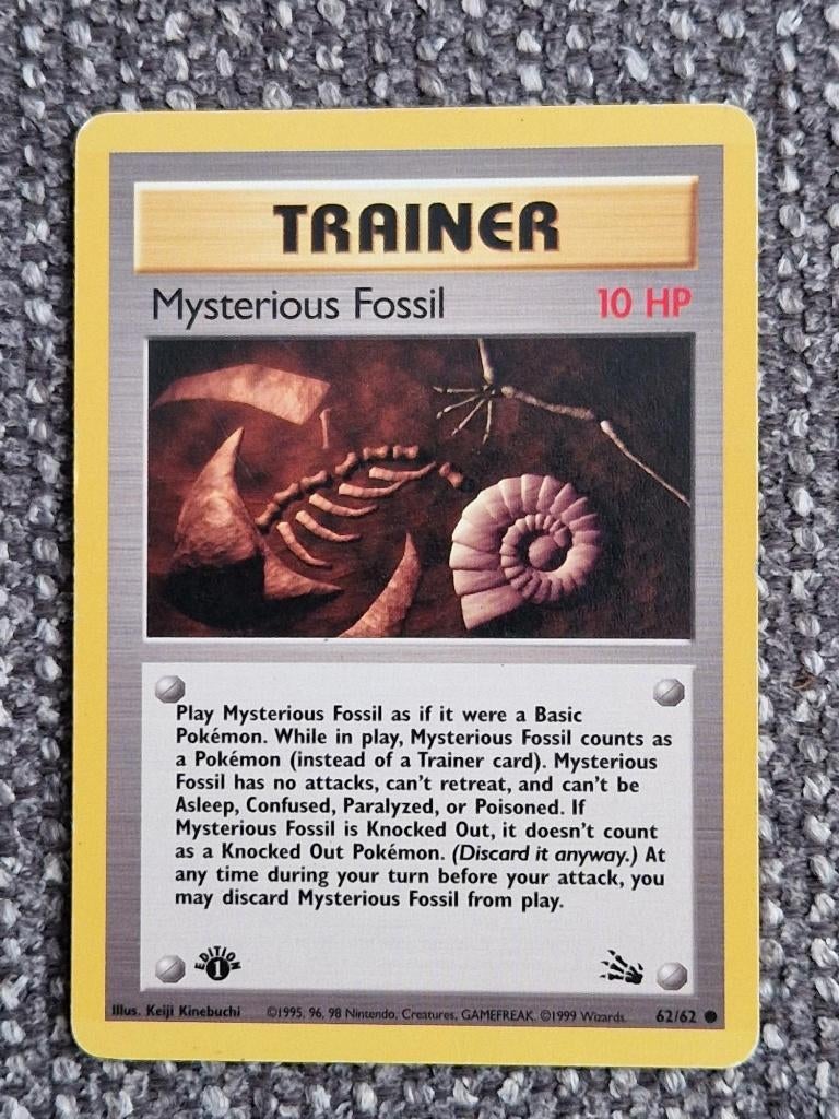 Vintage Pokémon #62/62 Mysterious Fossil – 1st Edition – LP, Ophalen of Verzenden, Gebruikt, Losse kaart