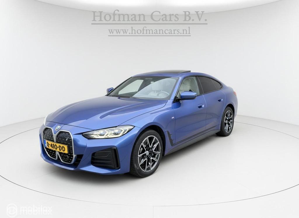 BMW i4 eDrive40 Soh 96% High Executive 84 kWh 2022 Incl BTW, Achterwielaandrijving, Beige, Blauw, 340 pk