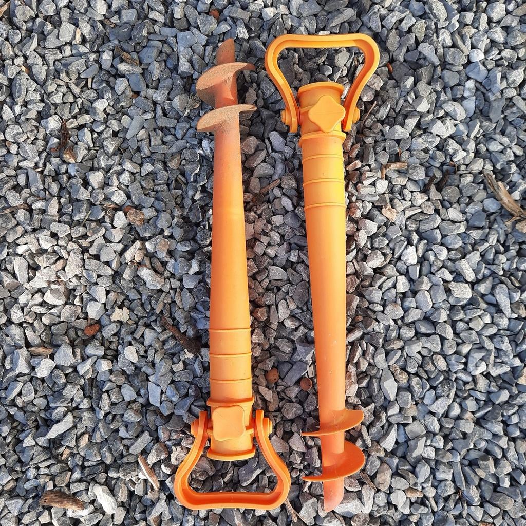 2x Oranje grondankers voor tent of parasol, Ophalen of Verzenden, Gebruikt