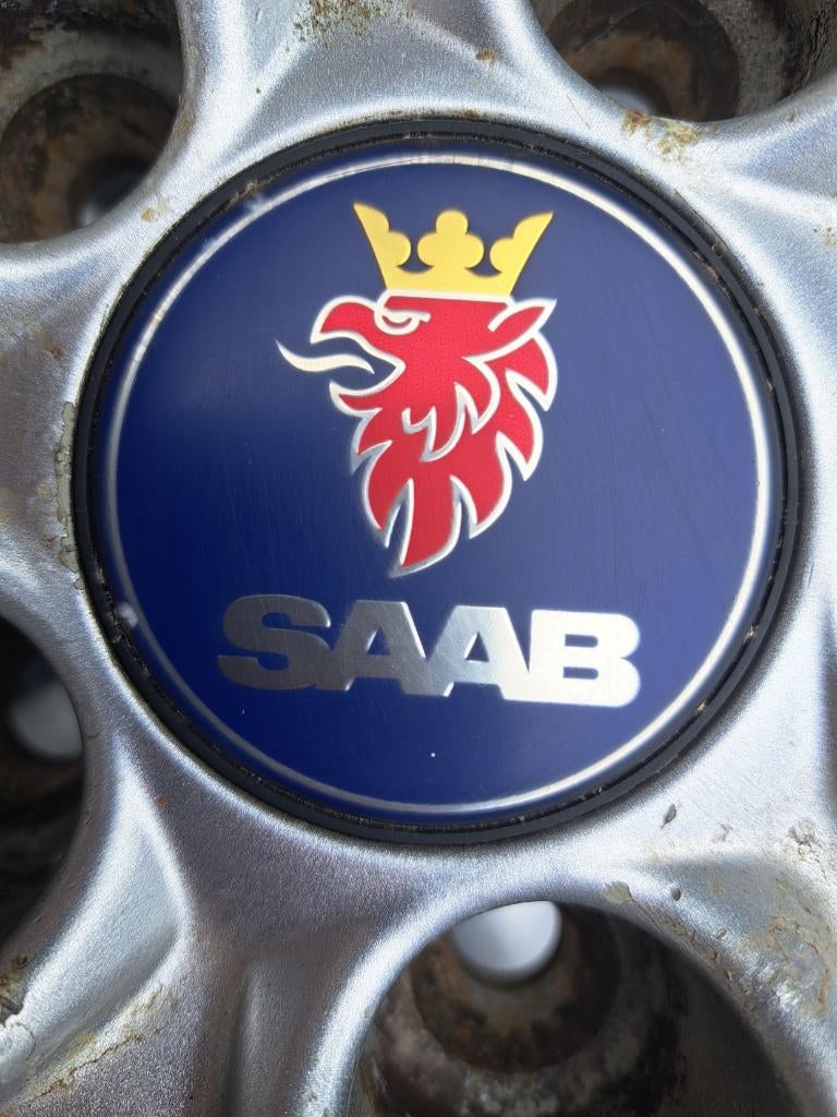 saab 9-3 naafdoppen met 17 inch velgen, Ophalen