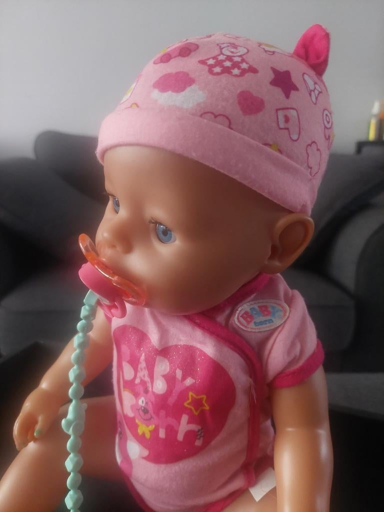 Baby Born pop met roze kleertjes en accessoires, Kinderen en Baby's, Speelgoed | Poppen, Ophalen of Verzenden