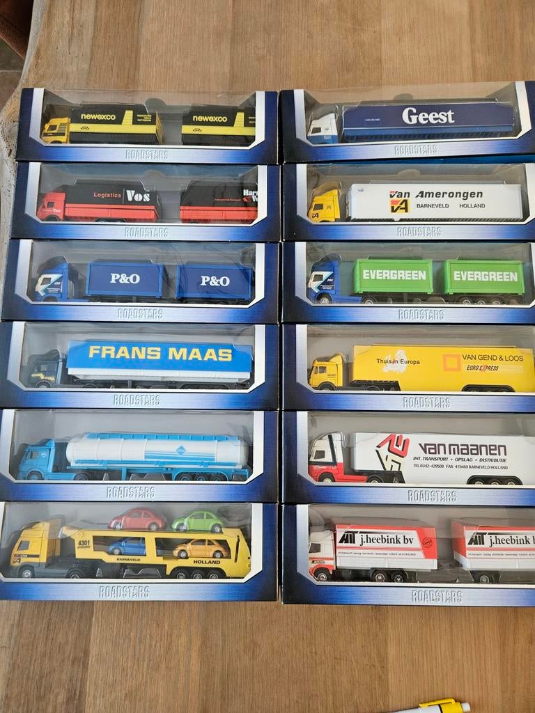 12 nieuwe Roadstars vrachtwagens met reclame, Hobby en Vrije tijd, Modelauto's | Overige schalen, Ophalen of Verzenden, Nieuw