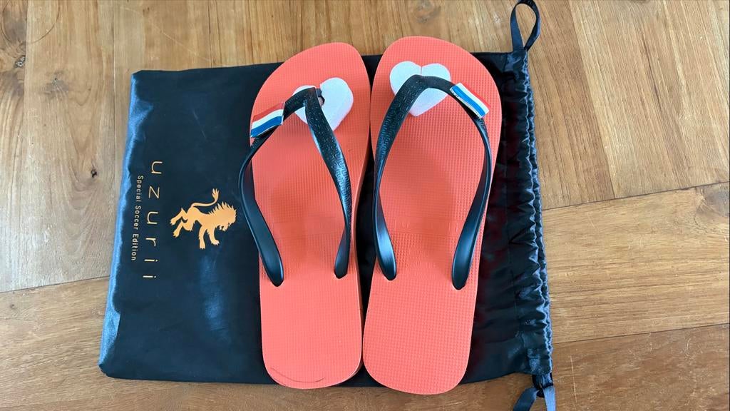 Uzurri teenslippers Holland! Maat 43/44. Nieuw, Kleding | Dames, Schoenen, Ophalen of Verzenden, Nieuw, Oranje, Slippers